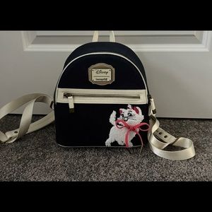 A loungefly denim Marie bag. No tags but never used before.